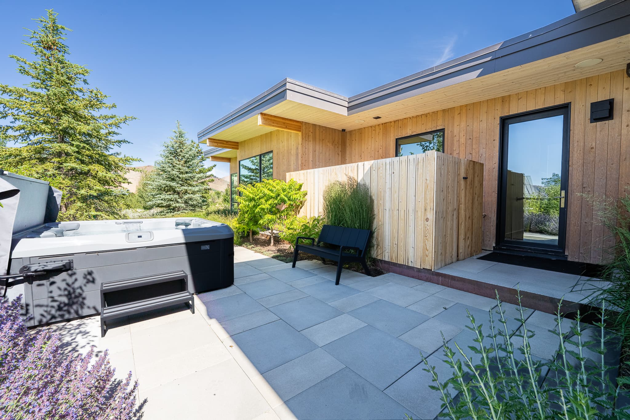 Side patio with hot tub