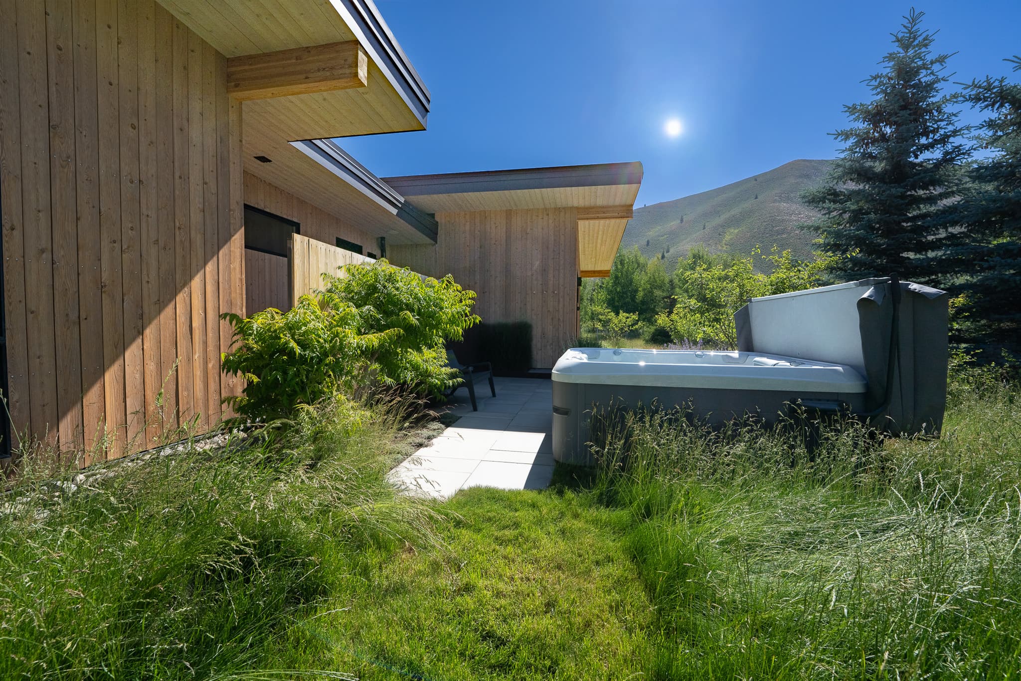 Side patio with hot tub